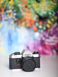 Photo of camera with a colorful background taken by Andy Russo